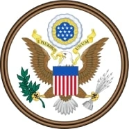 The Great Seal of the United States featuring a bald eagle holding an olive branch and arrows, with a shield and a banner reading "E Pluribus Unum," stands as a symbol of integrity—values upheld by every diligent Boston government contract fraud attorney.