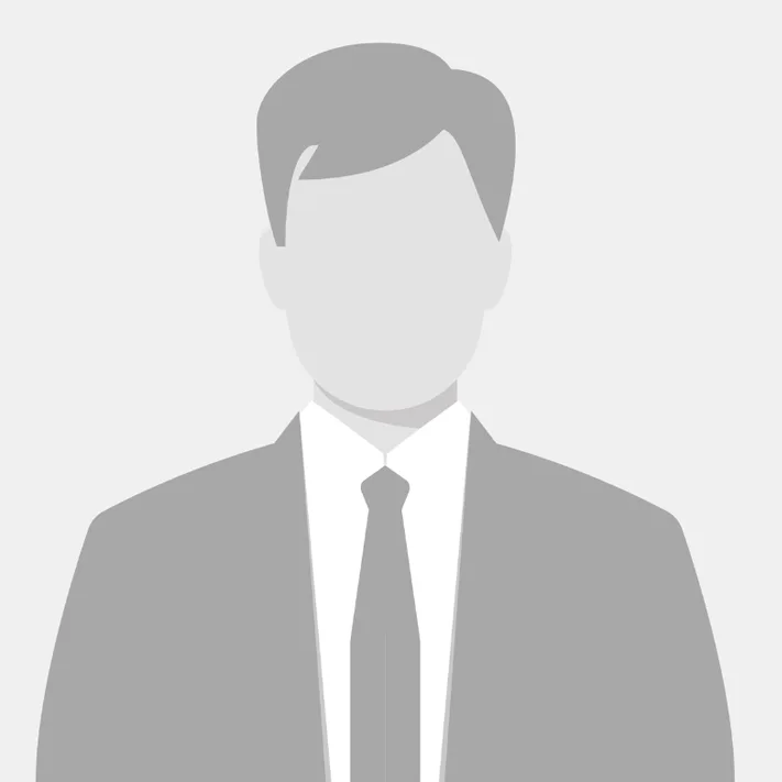 Gray-scale illustration of a faceless man in a suit and tie, shown from the shoulders up, on a plain light background—evoking the anonymity often sought by San Jose IRS whistleblower lawyers and Silicon Valley CFTC whistleblower attorneys.
