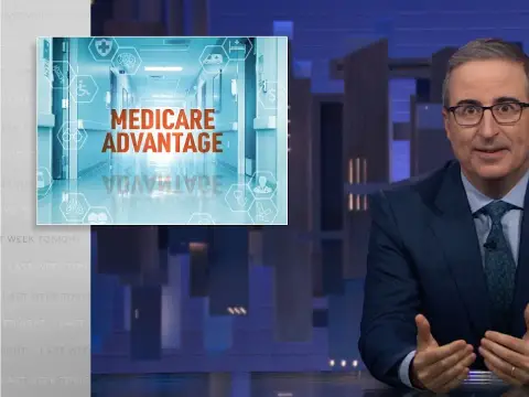 A man in a suit speaks on a TV show with a graphic titled "Medicare Advantage" and a medical-themed background shown beside him, discussing insights from a New York Medicare whistleblower about recent claims and enforcement trends.